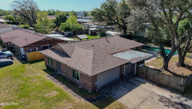 birds eye view of property with a residential view