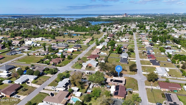 aerial view with a residential view and a water view