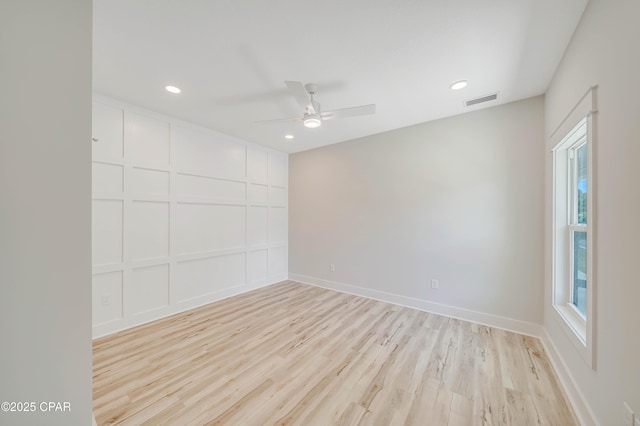 309 Paridiso Pl Unit A, Panama City Beach, FL 32413 - empty room with light wood-type flooring, ceiling fan, recessed lighting, and baseboards