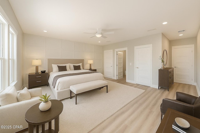 309 Paridiso Pl Unit A, Panama City Beach, FL 32413 - bedroom with light wood-type flooring, baseboards, ceiling fan, and recessed lighting