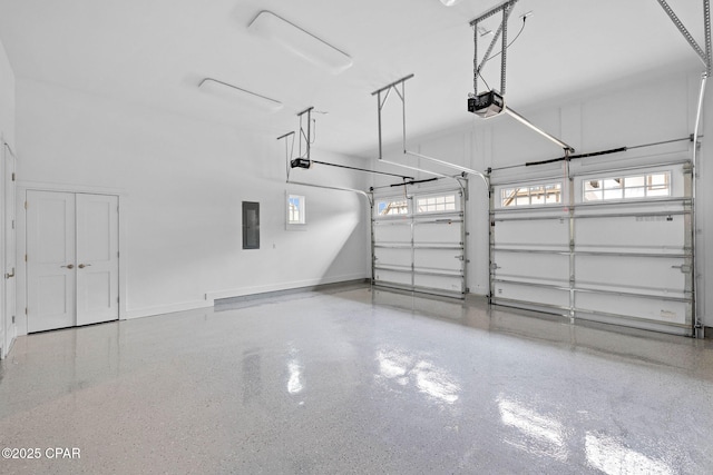 1502 Match Point Ln Unit 402, Panama City Beach, FL 32413 - garage with a garage door opener and electric panel