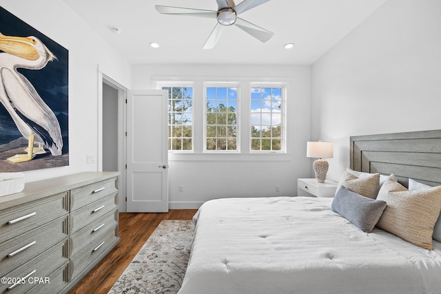 1502 Match Point Ln Unit 402, Panama City Beach, FL 32413 - bedroom with dark wood-style floors, a ceiling fan, and recessed lighting