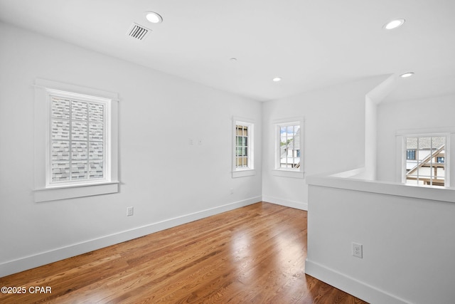 1502 Match Point Ln Unit 402, Panama City Beach, FL 32413 - unfurnished room featuring recessed lighting and wood finished floors