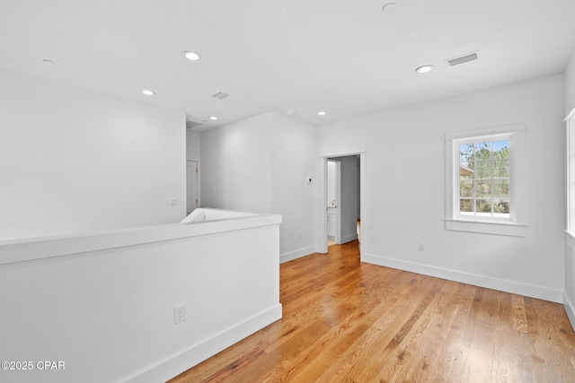 1502 Match Point Ln Unit 402, Panama City Beach, FL 32413 - spare room with recessed lighting and light wood-type flooring