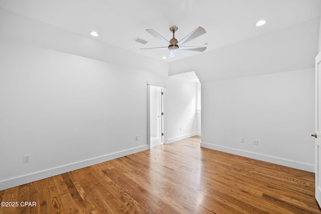 1502 Match Point Ln Unit 402, Panama City Beach, FL 32413 - empty room with ceiling fan, lofted ceiling, light wood-type flooring, and recessed lighting