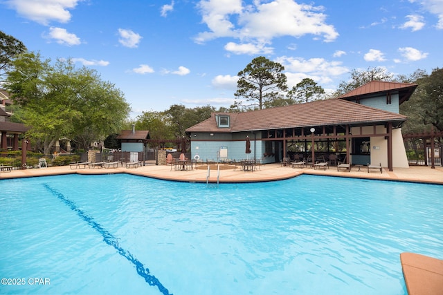 1502 Match Point Ln Unit 402, Panama City Beach, FL 32413 - community pool featuring a patio