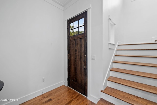 1502 Match Point Ln Unit 402, Panama City Beach, FL 32413 - entrance foyer with stairs and wood finished floors