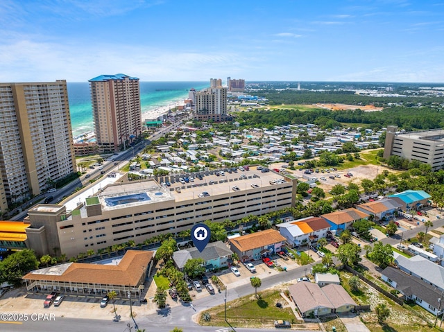 bird's eye view featuring a water view and a view of city