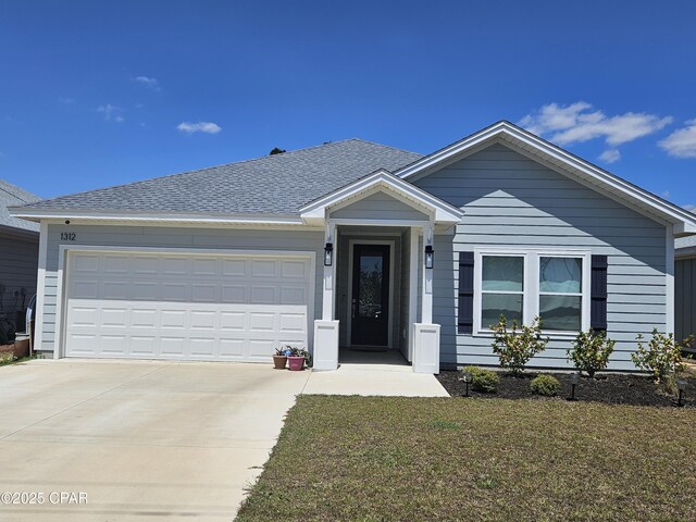 single story home featuring concrete driveway, a shingled roof, a front lawn, and a garage