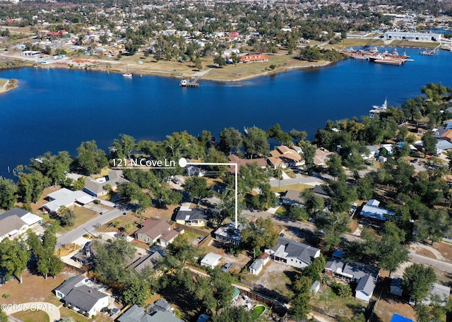aerial view with a residential view and a water view