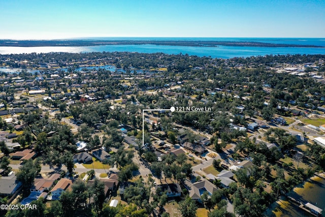 bird's eye view with a residential view and a water view