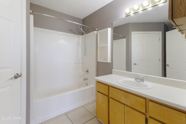 full bath featuring shower / bathtub combination, tile patterned floors, and vanity