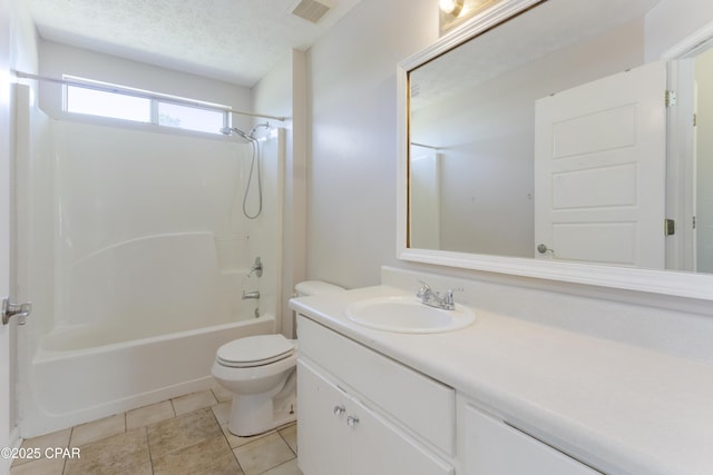 full bathroom with visible vents, vanity, toilet, tile patterned floors, and  shower combination