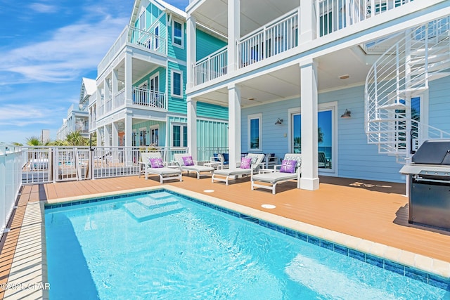 13643 Front Beach Rd, Panama City Beach, FL 32413 - outdoor pool featuring an outdoor living space, grilling area, and a deck