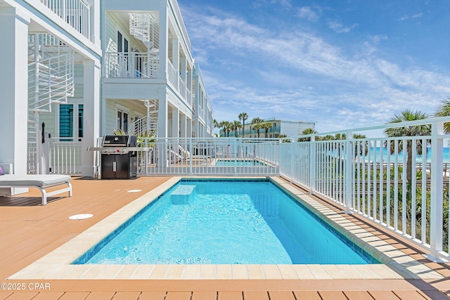 13643 Front Beach Rd, Panama City Beach, FL 32413 - view of swimming pool with area for grilling