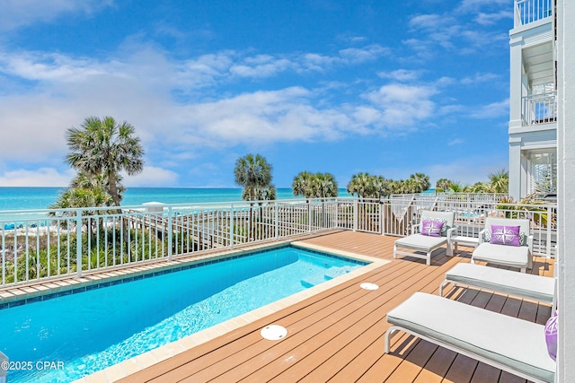 13643 Front Beach Rd, Panama City Beach, FL 32413 - view of swimming pool featuring a deck with water view