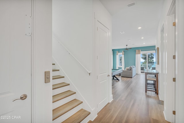 13643 Front Beach Rd, Panama City Beach, FL 32413 - stairway with wood finished floors and recessed lighting
