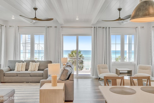 13643 Front Beach Rd, Panama City Beach, FL 32413 - living room featuring ceiling fan, beamed ceiling, wood finished floors, a water view, and recessed lighting