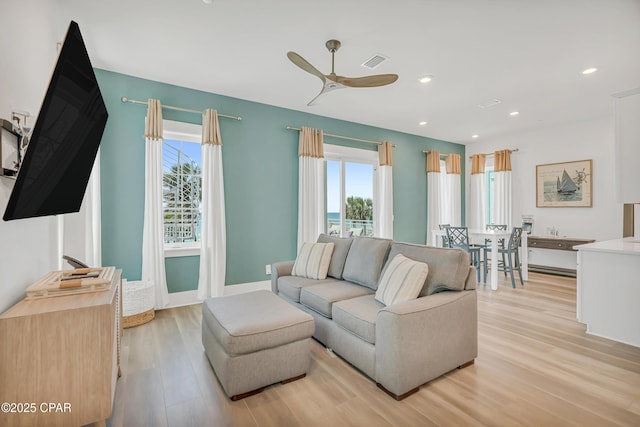 13643 Front Beach Rd, Panama City Beach, FL 32413 - living area featuring plenty of natural light, light wood-type flooring, a ceiling fan, and recessed lighting