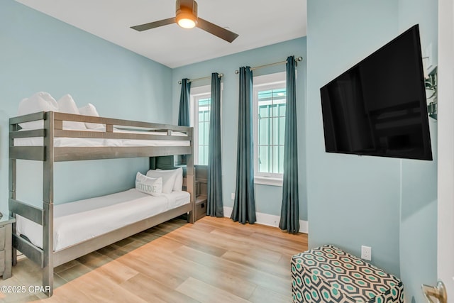 13643 Front Beach Rd, Panama City Beach, FL 32413 - bedroom featuring wood finished floors and a ceiling fan