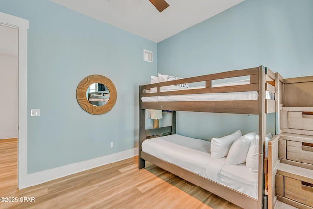 13643 Front Beach Rd, Panama City Beach, FL 32413 - bedroom featuring wood finished floors and ceiling fan