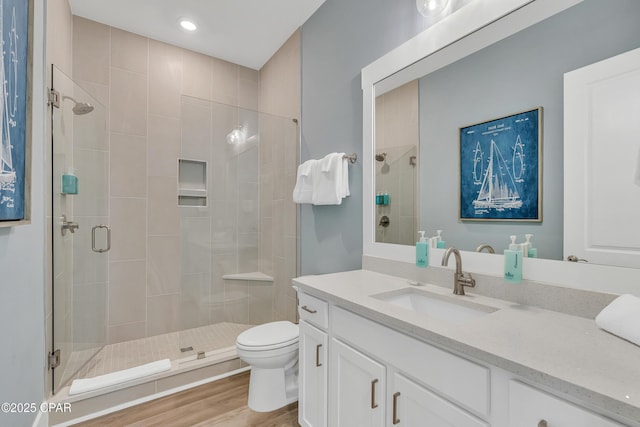 13643 Front Beach Rd, Panama City Beach, FL 32413 - full bathroom with vanity, a shower stall, and wood finished floors