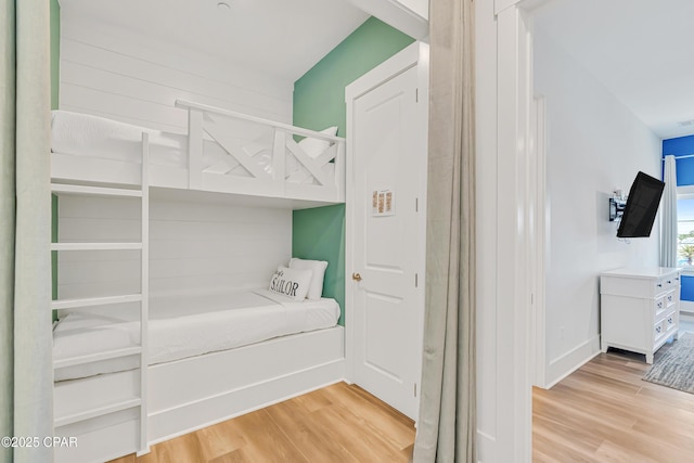 13643 Front Beach Rd, Panama City Beach, FL 32413 - bedroom with light wood-type flooring