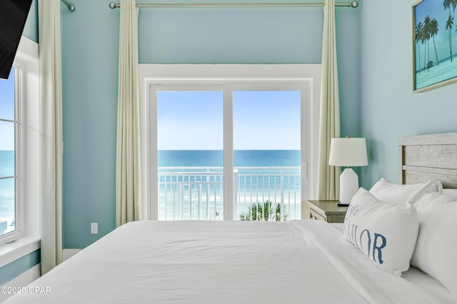 13643 Front Beach Rd, Panama City Beach, FL 32413 - bedroom with multiple windows, a water view, and access to exterior