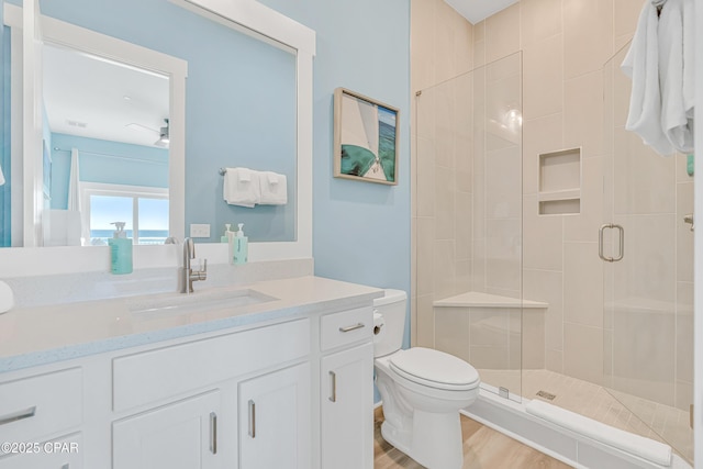 13643 Front Beach Rd, Panama City Beach, FL 32413 - bathroom with a stall shower, vanity, and wood finished floors