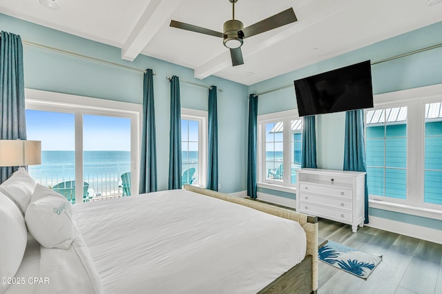 13643 Front Beach Rd, Panama City Beach, FL 32413 - bedroom with beam ceiling, wood finished floors, a water view, access to exterior, and ceiling fan