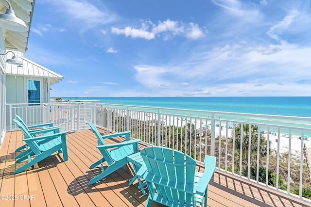13643 Front Beach Rd, Panama City Beach, FL 32413 - wooden terrace with view of water and beach