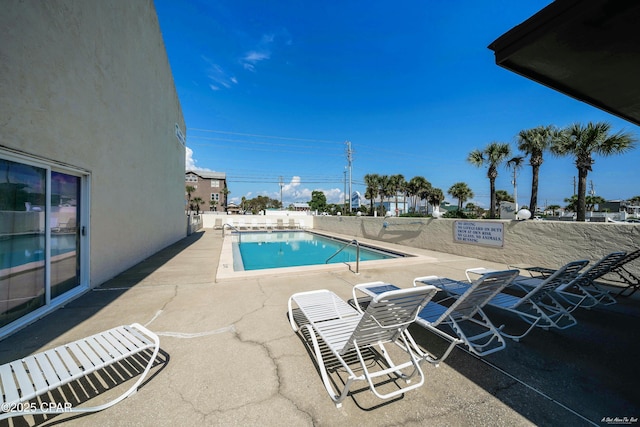 pool with a patio