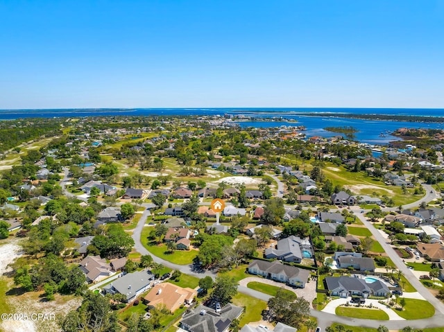 aerial view featuring a water view and a residential view