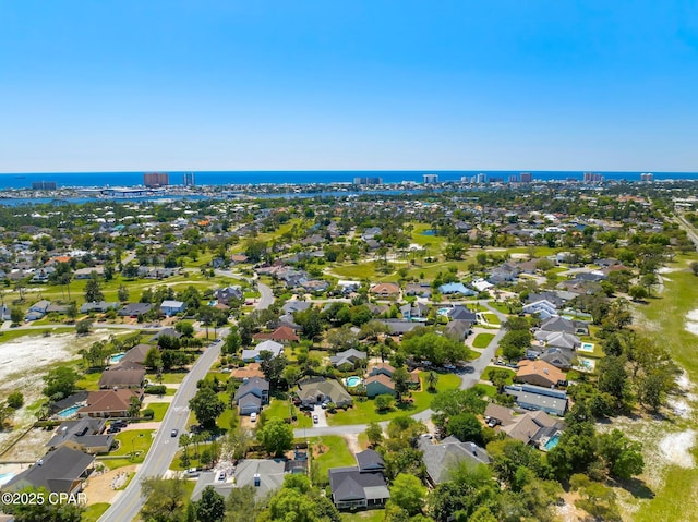 aerial view with a water view and a residential view
