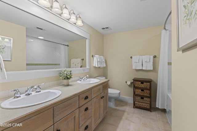 9300 Baytowne Wharf Blvd Unit 528/530, Miramar Beach, FL 32550 - full bath with toilet, tile patterned flooring, double vanity, baseboards, and shower / bath combination with curtain
