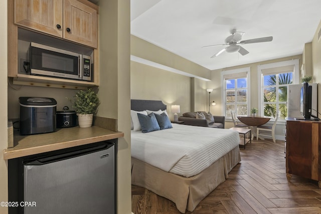 9300 Baytowne Wharf Blvd Unit 528/530, Miramar Beach, FL 32550 - bedroom with freestanding refrigerator and ceiling fan