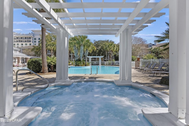 9300 Baytowne Wharf Blvd Unit 528/530, Miramar Beach, FL 32550 - community pool featuring a pergola, a hot tub, a patio area, and fence