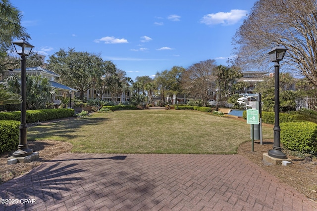 9300 Baytowne Wharf Blvd Unit 528/530, Miramar Beach, FL 32550 - view of community featuring a yard