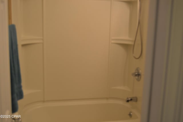 full bathroom with bathing tub / shower combination