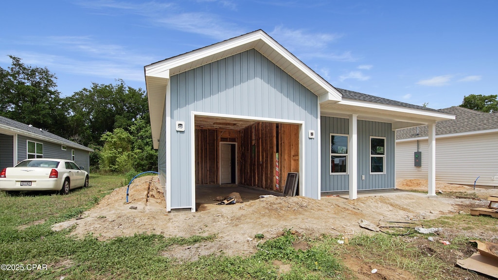 1547 Chandlee Ave Unit A, Panama City, FL 32405 - view of front of property featuring an attached garage and board and batten siding