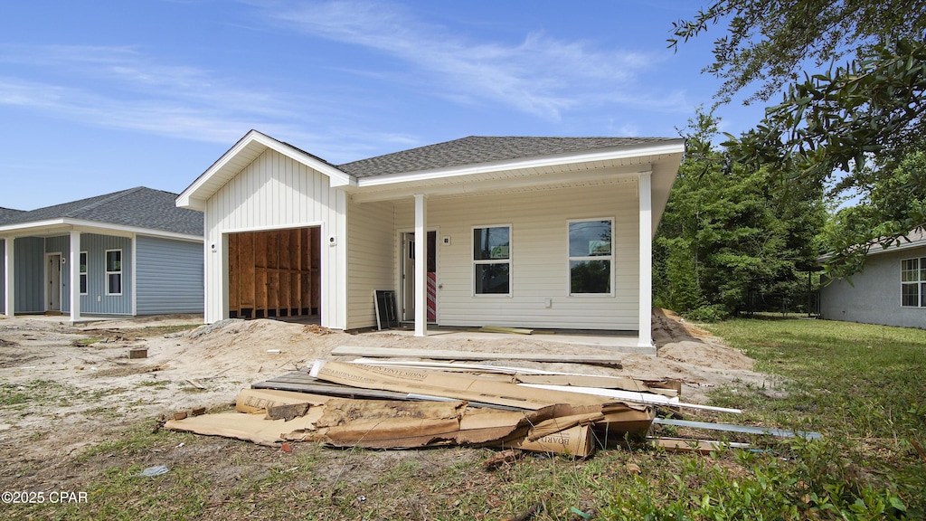 1549 Chandlee Ave Unit A, Panama City, FL 32405 - view of front of property featuring a garage and a shingled roof