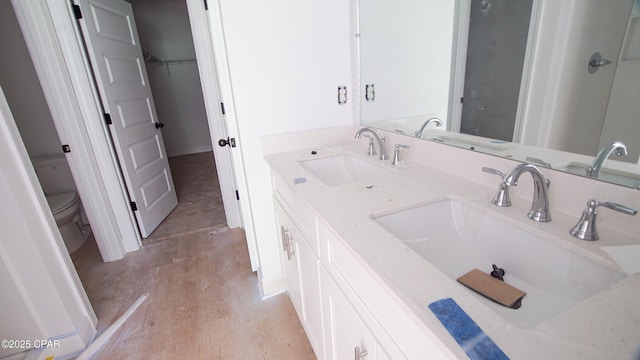 1549 Chandlee Ave Unit A, Panama City, FL 32405 - bathroom featuring double vanity and a spacious closet