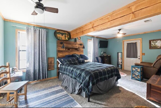 carpeted bedroom with a ceiling fan, crown molding, and visible vents
