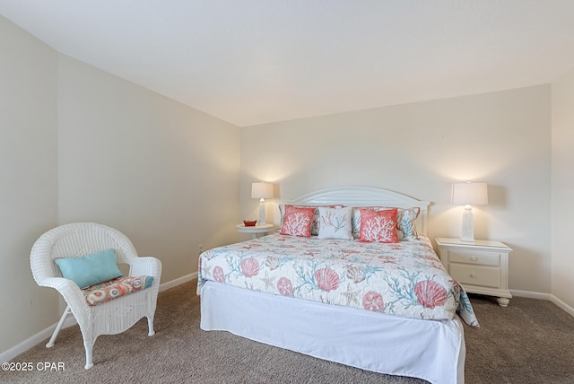 bedroom with carpet flooring and baseboards