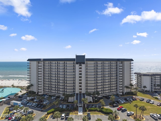 view of apartment building / complex featuring a water view
