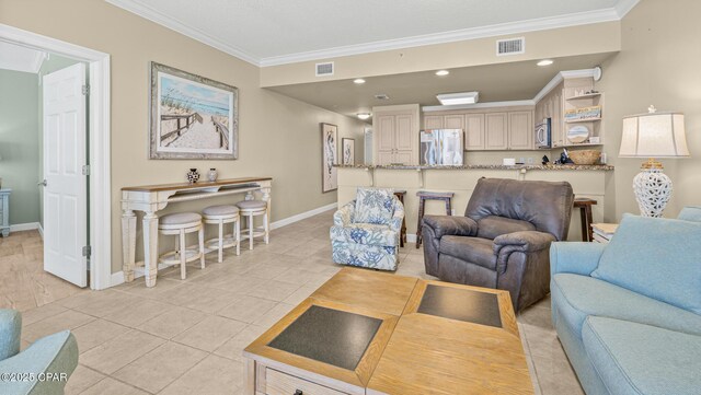 9450 S Thomas Dr Unit 1609C, Panama City Beach, FL 32408 - living area featuring ornamental molding, baseboards, light tile patterned floors, and recessed lighting