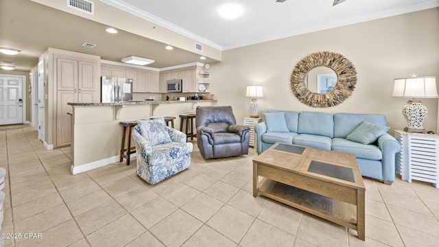 9450 S Thomas Dr Unit 1609C, Panama City Beach, FL 32408 - living room featuring light tile patterned floors, ornamental molding, baseboards, and recessed lighting
