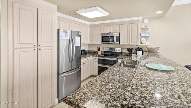 9450 S Thomas Dr Unit 1609C, Panama City Beach, FL 32408 - kitchen featuring appliances with stainless steel finishes, open shelves, a sink, a peninsula, and dark stone counters