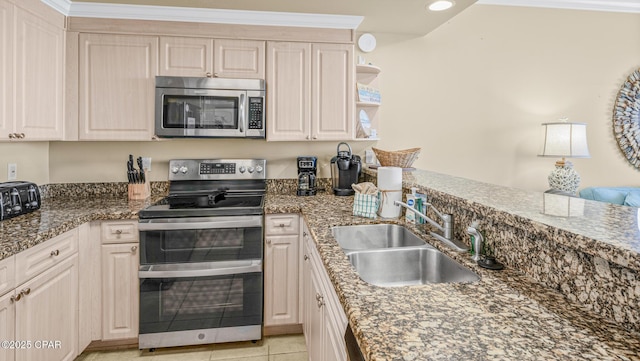 9450 S Thomas Dr Unit 1609C, Panama City Beach, FL 32408 - kitchen with stainless steel appliances, a sink, light tile patterned floors, dark stone countertops, and open shelves