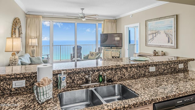 9450 S Thomas Dr Unit 1609C, Panama City Beach, FL 32408 - kitchen with a sink, dishwashing machine, ceiling fan, crown molding, and dark stone counters